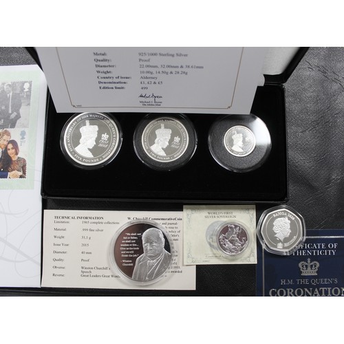 285 - A large assortment of fine and sterling silver coins and medals (12) covering a range of topics incl... 