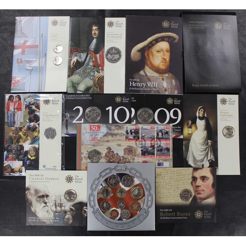 211 - An assortment of BUNC year sets and coins (12) including 2011 Cities £1 2-coin set, 2010 Restoration... 