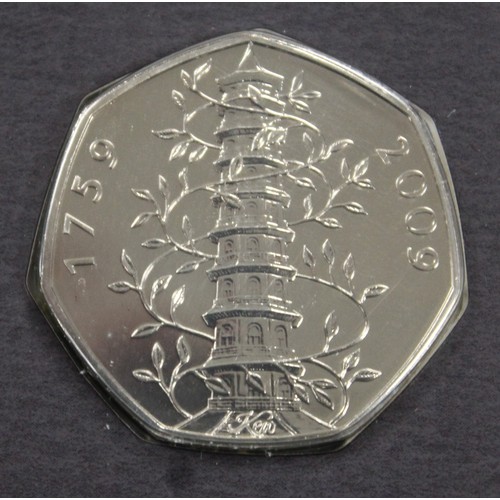 144 - BUNC 2009 Kew Gardens 50p in Royal Mint flower presentation pack. nFDC with soft obverse toning.