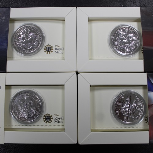 239 - Silver Britannia 1oz £2 coins (4) in Royal Mint presentation packs comprising 2009 (2), 2010 & 2... 