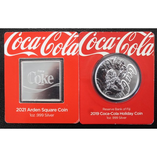 311 - Coca Cola Fiji $1 coins (2) comprising 2019 Christmas 1oz and Arden Square 1oz. Accompanying the lot... 