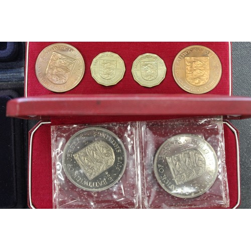 272 - A wide and varied assortment of coins and related items to include BUNC year sets (8), Jersey 1966 p... 