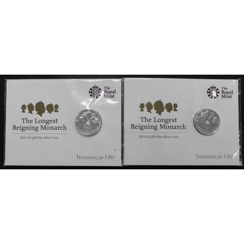 295 - A pair of 2015 Longest Reigning Monarch £20 coins. As issued in Royal Mint packs.