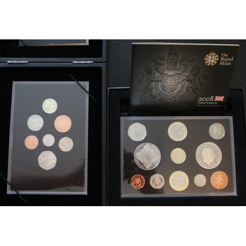 273 - 2008 Proof year sets (2) including 11-coin proof set box & 7-coin Royal Shield of Arms set. Both... 