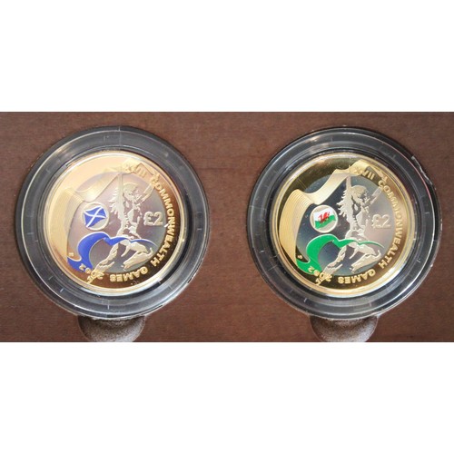 246 - 2002 Silver proof piedfort Commonwealth Games £2 coin set. Cased with information booklet/COA. Some ... 