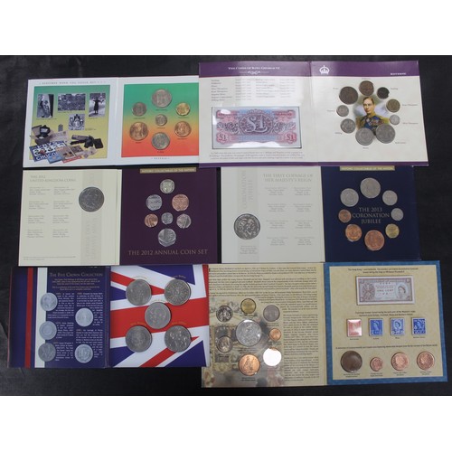 308 - An assortment of year sets, decimal and pre-decimal, including stamps & banknotes (6). Includes ... 