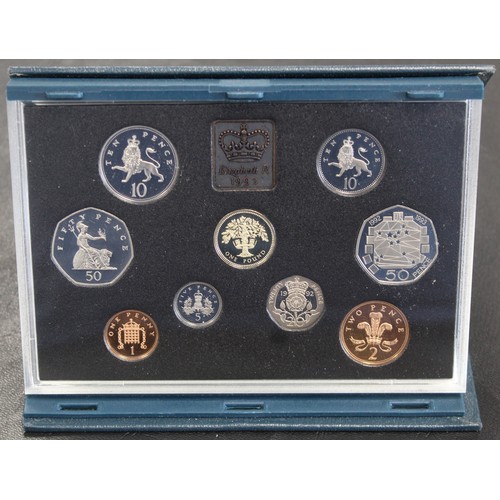 264 - 1992 Proof 9-coin year set in blue case with COA. Includes the EEC Dual date 1992-1993 50p coin. All... 