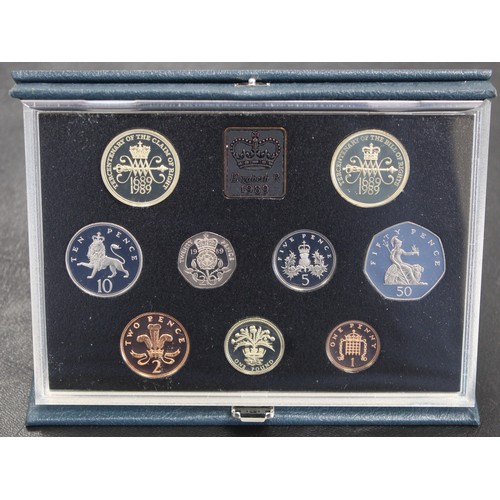 263 - 1989 Proof 9-coin year set in blue case with COA. Includes the desirable Claim of Rights £2 coin. Al... 