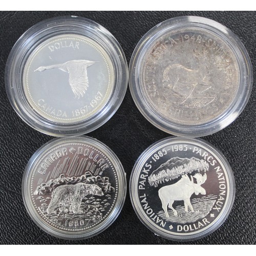 306 - A selection of mainly USA & Canadian silver and proof sets including 1984 Canada proof year set ... 