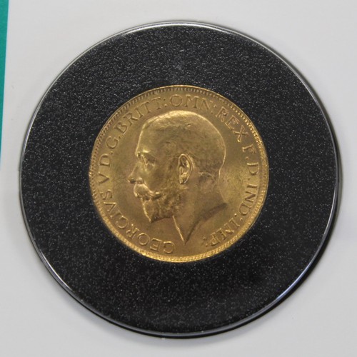 115 - 1925 Sovereign, George V. Presented in Royal Mint collector services sealed pack with accompanying c... 