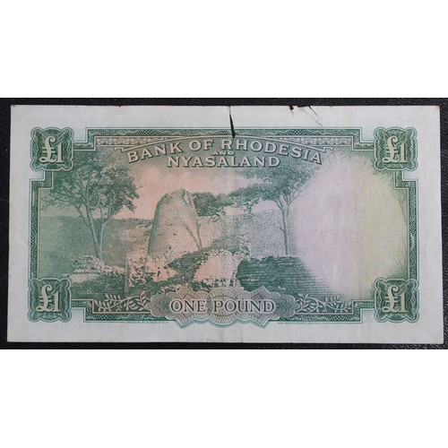 17 - Rhodesia & Nyasaland 1961 £1 banknote, Elizabeth II. Richards signature. Multiple folds and mult... 