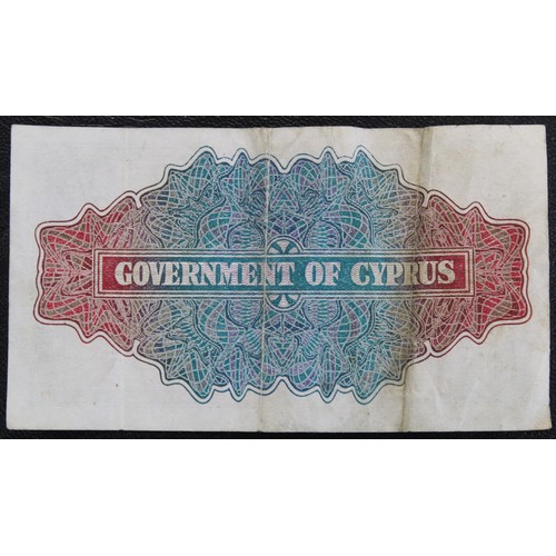 15 - Cyprus 1941 1 shilling banknote, George VI. Multiple folds and corners bent. Scarce.