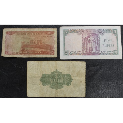 14 - Ceylon banknotes (3) of George V & Elizabeth II. Comprises 1928 2 rupees, 1952 2 Rupees & 19... 