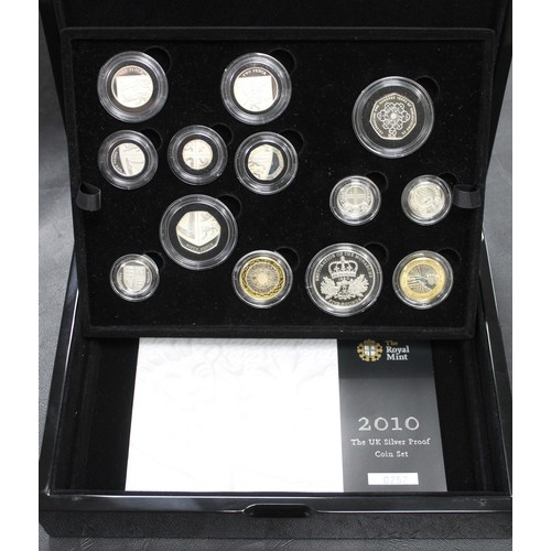 394 - 2010 Royal Mint 13-coin silver proof set including London & Belfast £1 coins and Restoration of ... 