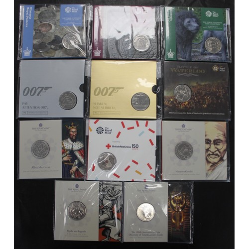 378 - BUNC £5 coins (11) of varying interest comprising 2015 Battle of Waterloo, 2022 The Infamous Prison,... 