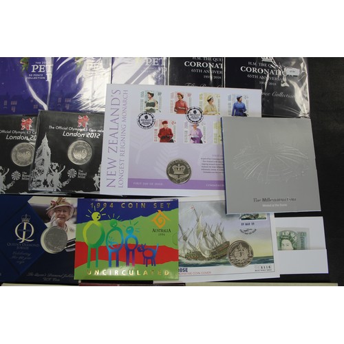 416 - An extensive offering of mainly BUNC coins and sets (43) of varied interest. Includes a mix of UK an... 