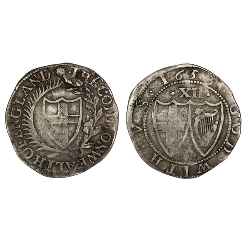 92 - 1653 Shilling, The Commonwealth of England, mm. Sun. A small planchet flaw below THE on obverse. Gen... 