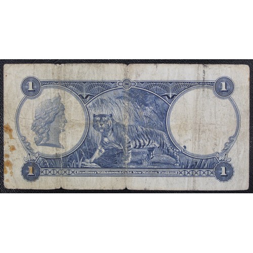 18 - 1935 Straits Settlements $1 George V banknote payable in Singapore. Multiple folds, stains & min... 