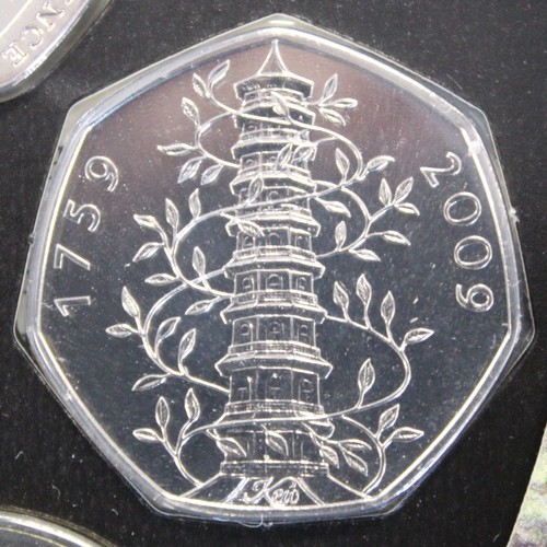 393 - BUNC 2009 year set featuring the Kew Gardens & set-only shield 50p coins. All as struck.