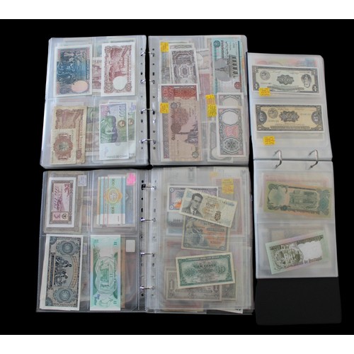 18 - In excess of 300 world banknotes in three collectors albums. Specimen set of Euro banknotes are repr... 