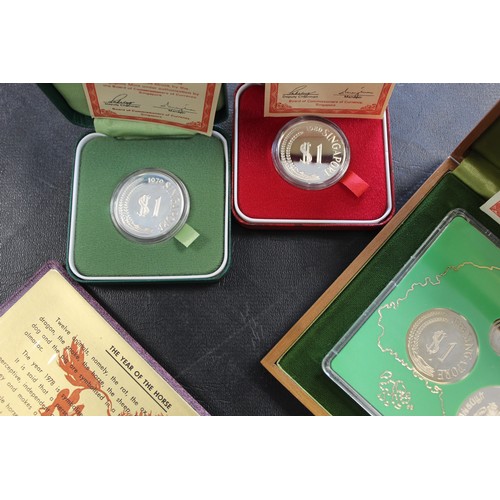 327 - Singapore, a large collection of assorted proof and BUNC coin in silver and base metal to include 19... 