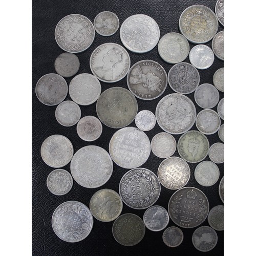 322 - British India, approx. 550g silver issues, two anna to one rupee of which most are pre-1920 examples... 