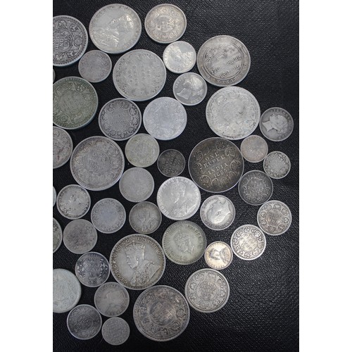 322 - British India, approx. 550g silver issues, two anna to one rupee of which most are pre-1920 examples... 