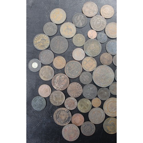 320 - Over 850g mainly 19th century mixed UK & World copper and bronze coins. A varied assortment heav... 