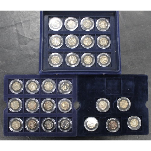 254 - BUNC London 2012 Olympics 50p collection housed in 3-tier display case. Missing COA's and the majori... 