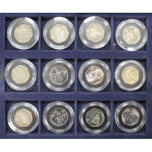 254 - BUNC London 2012 Olympics 50p collection housed in 3-tier display case. Missing COA's and the majori... 