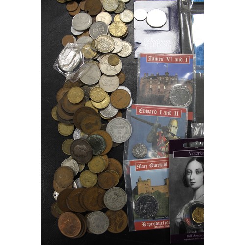 345 - An extensive collection of miscellaneous items to include territory £2 coins, dinosaur 50p's, ... 