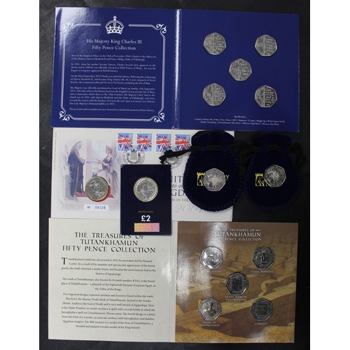 273 - An assortment of UK & Territory 50p & £2 coins to include King Charles III 5-coin 50p set an... 