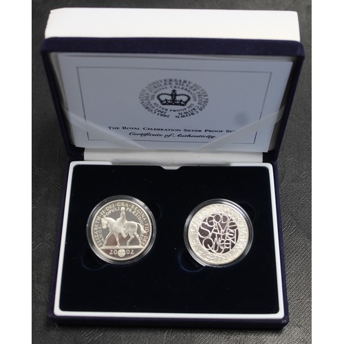 283 - The Royal Celebration silver proof set comprising 2002 & 2003 silver proof £5 coins in presentat... 