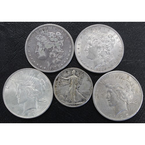 324 - Coins of America, silver dollars and half dollars (5) including 1879 Morgan dollar, 1880 Morgan doll... 