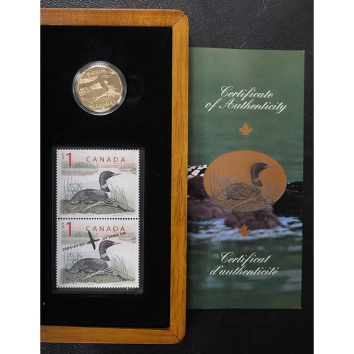 317 - Canada, The Elusive Loon coin & stamp set comprising 2004 $1 