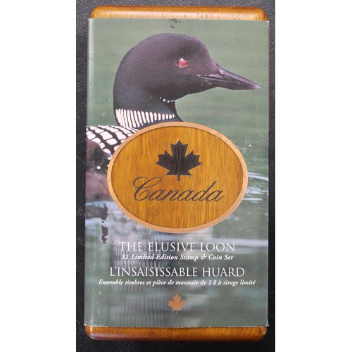 317 - Canada, The Elusive Loon coin & stamp set comprising 2004 $1 