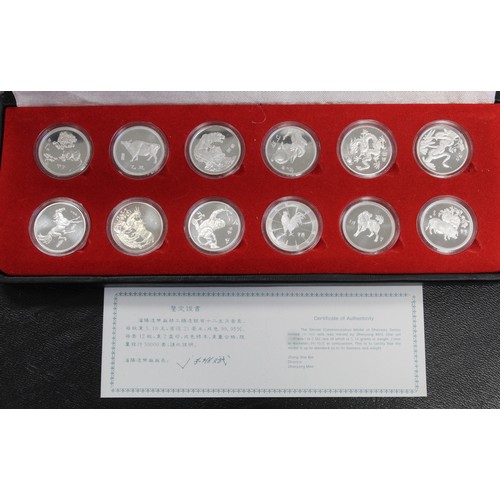 330 - China, 1980's and 1990's Shengxiao Lunar series set of 12 medals each struck in fine silver. Cased w... 