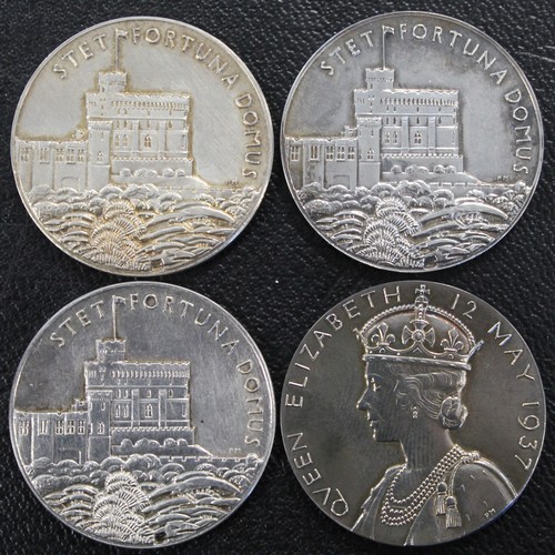 73 - Royal mint official silver medals (4) comprising 1935 George V silver jubilee (3) and 1937 Coronatio... 