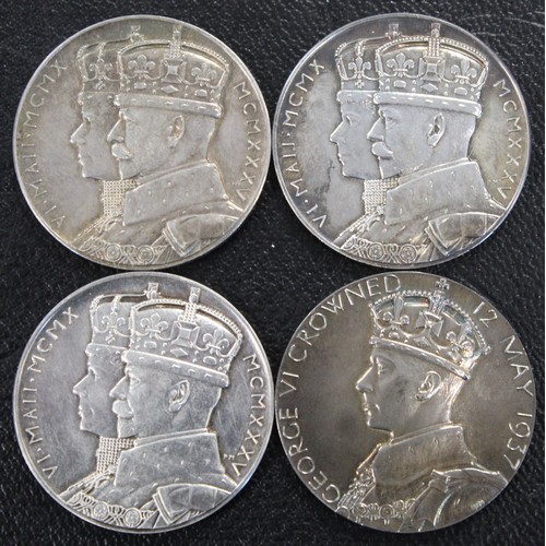 73 - Royal mint official silver medals (4) comprising 1935 George V silver jubilee (3) and 1937 Coronatio... 