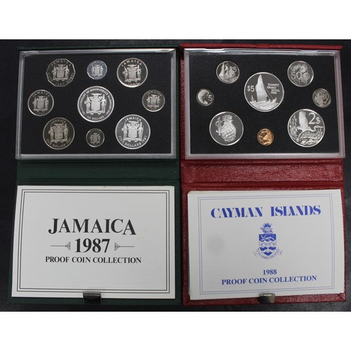 181 - A pair of Caribbean Royal Mint proof sets comprising 1987 Jamaica set with $10 and $5 in silver, and... 