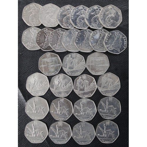 214 - A dealer/stacker selection of scarcer 50p coins (28) comprising 2011 Football (2), 2011 Triathlon (5... 