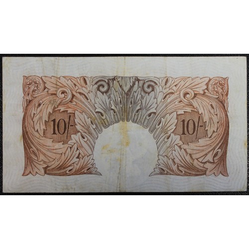 10 - Bank of England red/brown 10 shilling note, K.O. Peppiatt, B256. S/N 61O 171123. Multiple folds and ... 