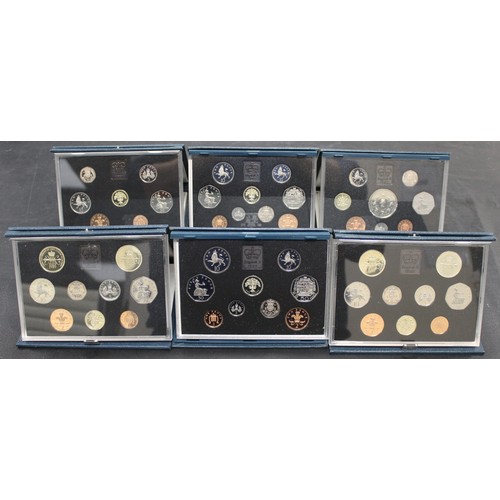 274 - Royal Mint proof sets (6) comprising 1987, 1989 (2), 1992 (2) and 1993. All in blue presentation cas... 