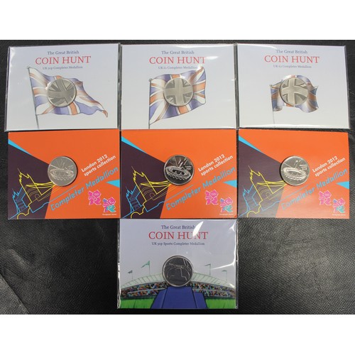 237 - A selection of completer medals (7) comprising GBCH 50p, £1 & £2 medals, 2012 carded Olympic med... 