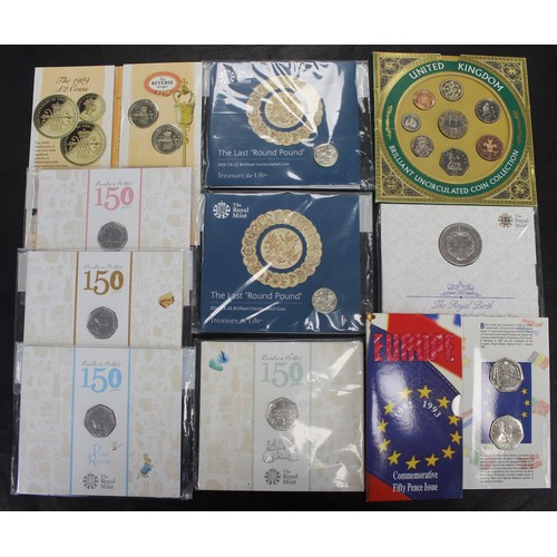 257 - An assortment of BUNC coins and year sets in Royal Mint packs (10) comprising 1989 2-coin £2 set wit... 