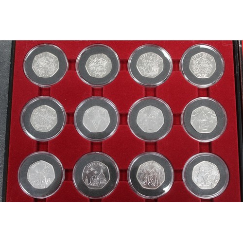 241 - A selection of 40 BUNC 50p coins from UK and Territories to include 2019 Military 5-coin set, Tales ... 