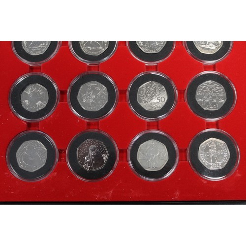 241 - A selection of 40 BUNC 50p coins from UK and Territories to include 2019 Military 5-coin set, Tales ... 