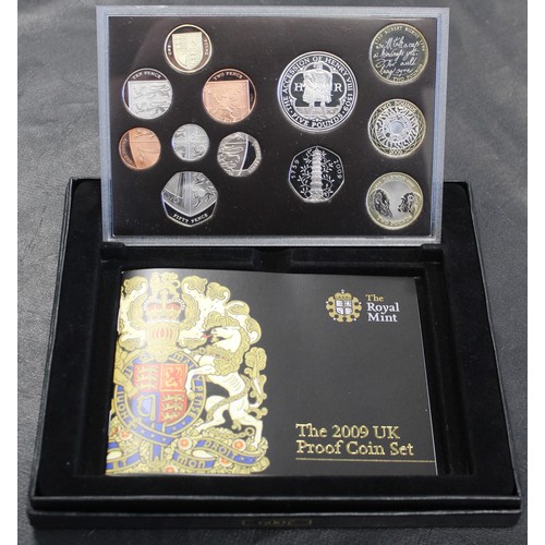 265 - 2009 12-coin proof set with Kew Gardens 50p. Housed in presentation box with COA booklet. Some sligh... 