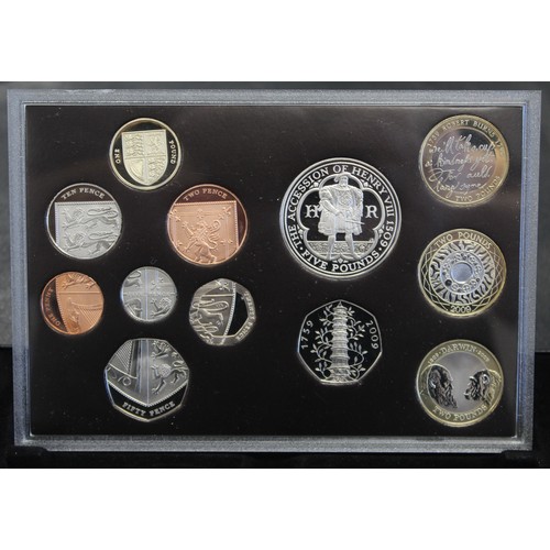 265 - 2009 12-coin proof set with Kew Gardens 50p. Housed in presentation box with COA booklet. Some sligh... 