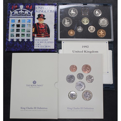 282 - A selection of proof and BUNC year sets (3) comprising 1992 proof year set with dual-date 50p, 2023 ... 